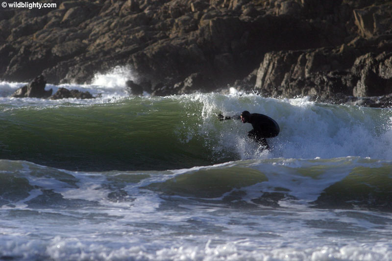 Surfing at Cable Bay (Porth Trecastell) on Anglesey