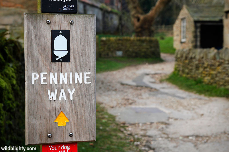 A sign for the Pennine Way in Edale, Peak District.