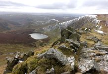 Wintry view of Llyn Lluncaws from Cadair Berwyn